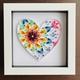 Quilled rainbow mandala inspired heart made of twirled paper, displayed in a white box frame.