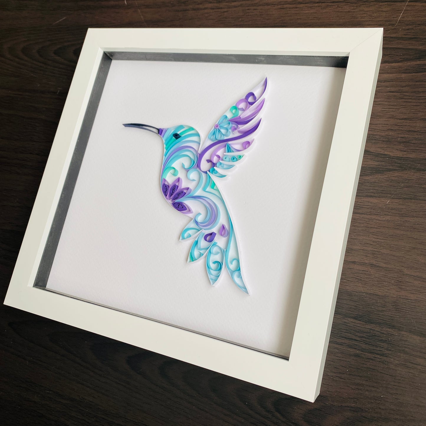 Hummingbird in purple and blue Quilling Art