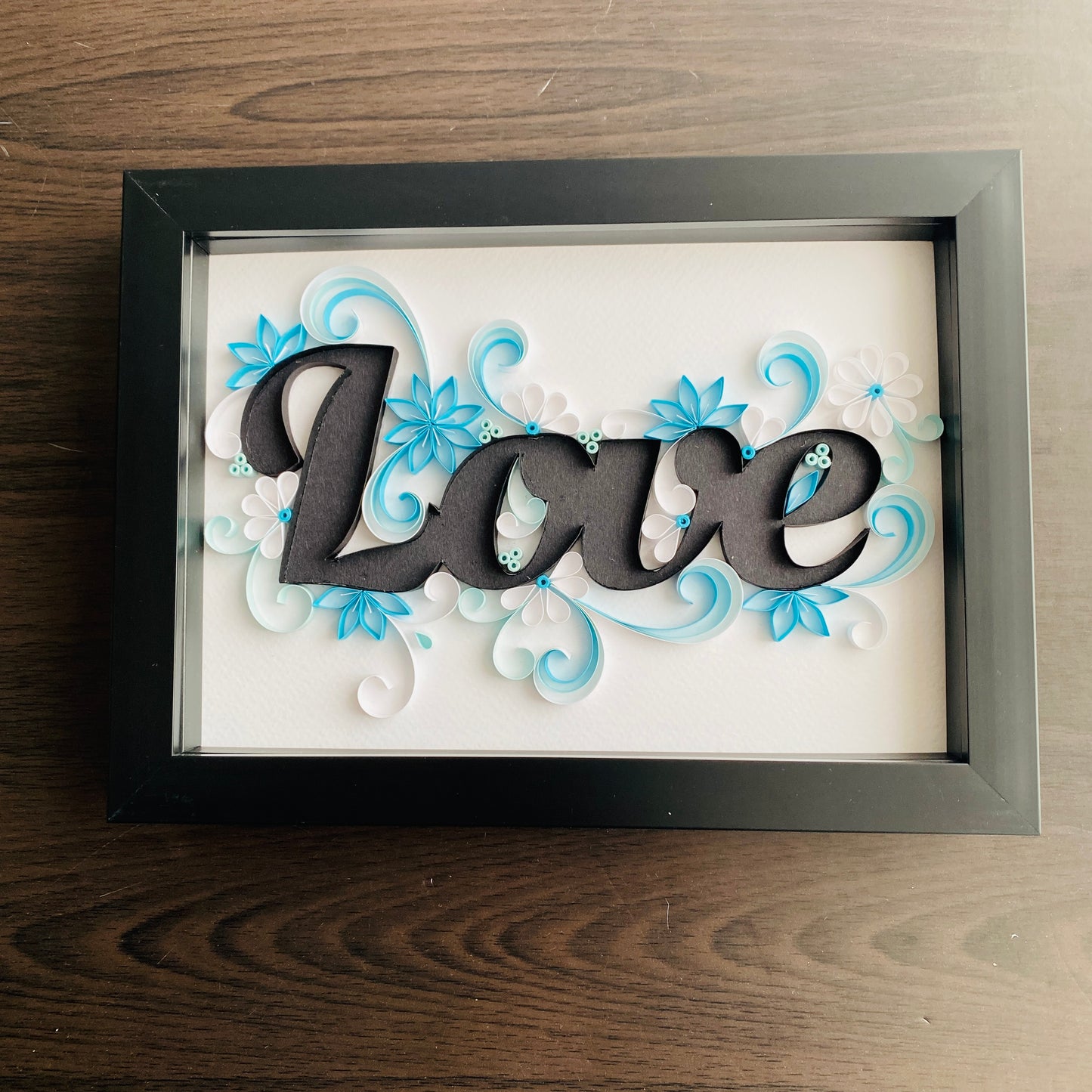 Love - blue floral quilled black frame