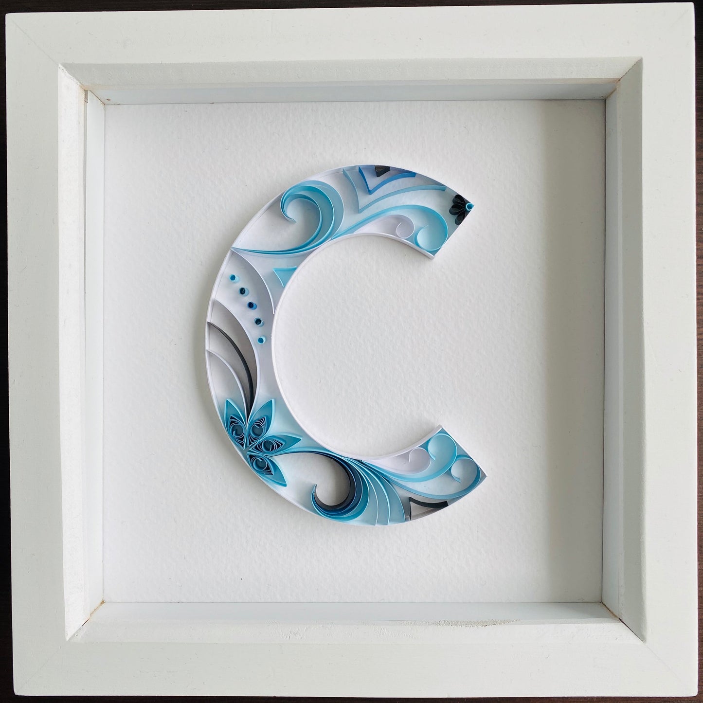 Blue, Black and White Quilling Art Letter