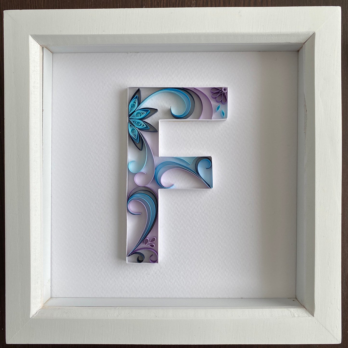 Blue and Purple Quilling Art Letter