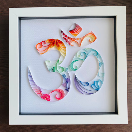 Rainbow quilled Aum/Om made of twirled paper strips. I